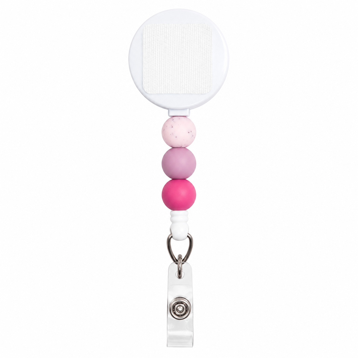 Pink and purple beaded badge reel with blush pink, lavender, and berry pink silicone beads, retractable interchangeable badge reel compatible with plastic and hardboard add-ons.