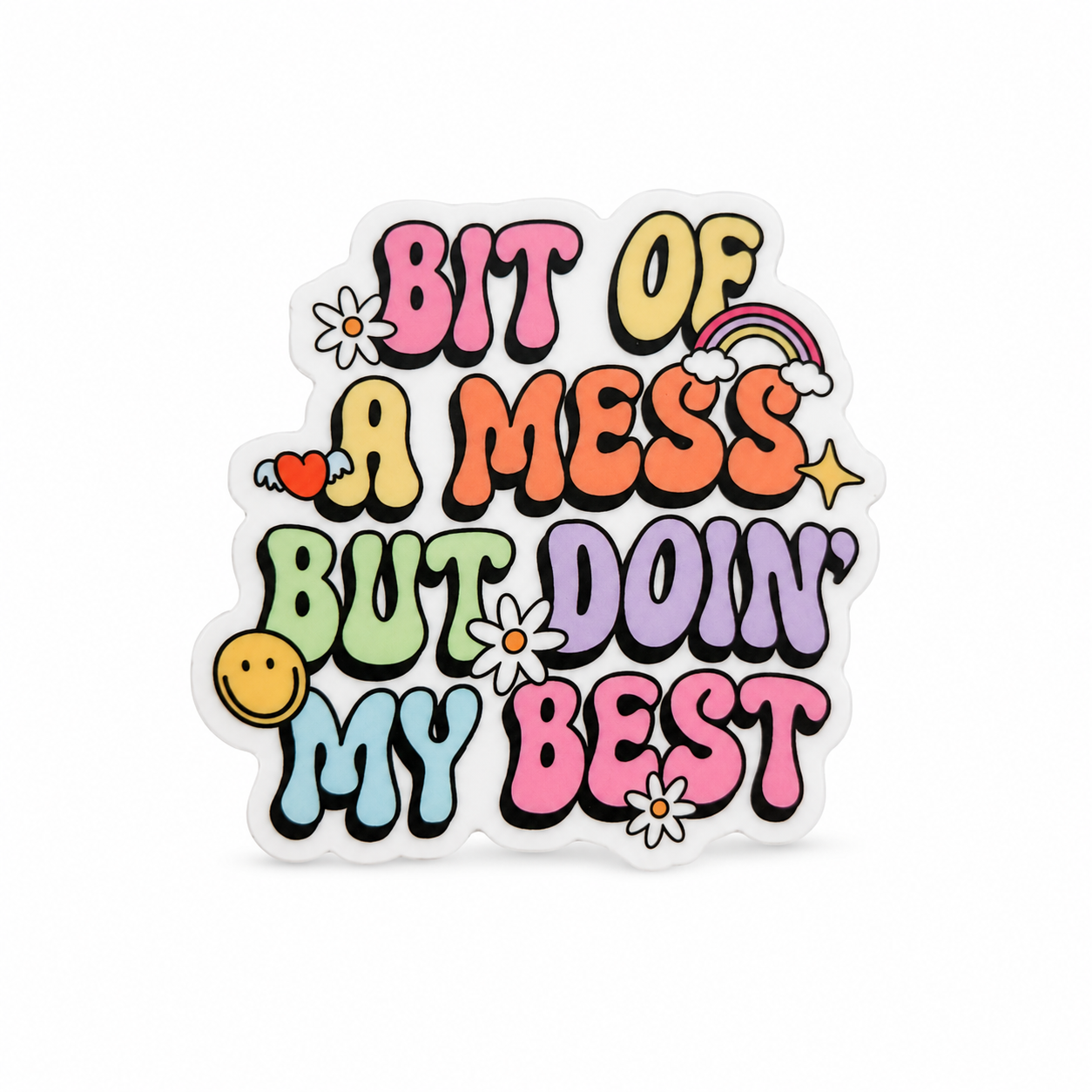 BIT OF A MESS BUT DOIN’ MY BEST plastic add-on with colorful retro text, daisies, a rainbow, hearts, and a smiley face, compatible with interchangeable badge reel bases.