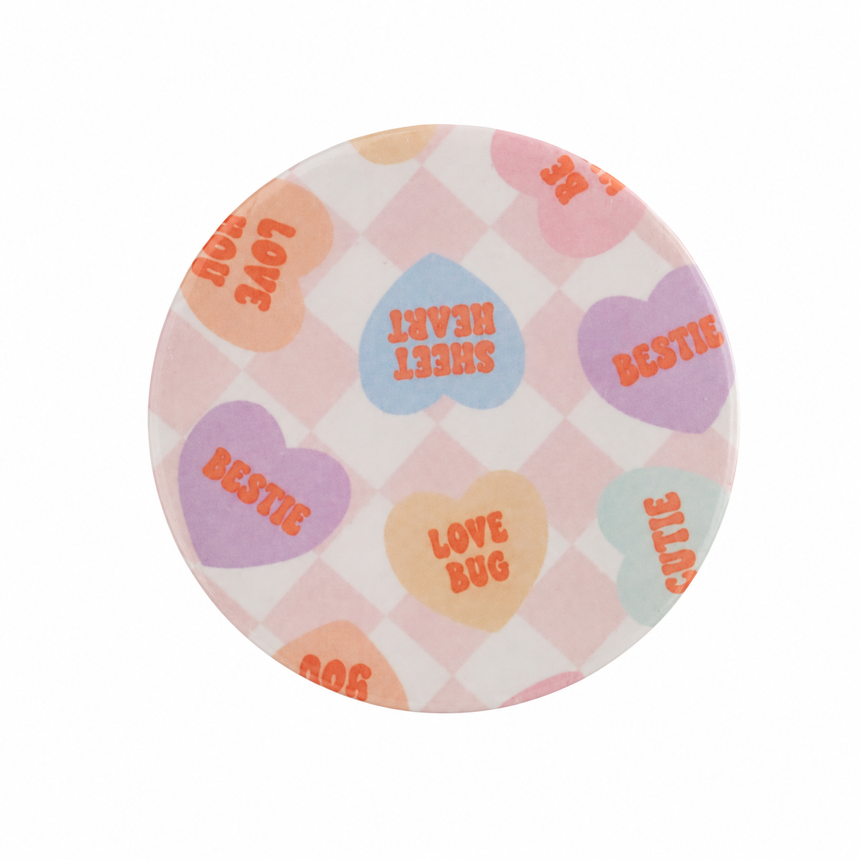 Valentine’s Day hard board add-on with pastel conversation hearts reading LOVE BUG, SWEET HEART, BESTIE and CUTIE, compatible with interchangeable badge reel bases.