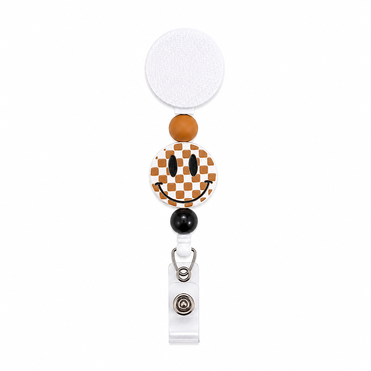 Checkered smiley badge reel with mustard and black silicone beads, retro happy face design, white retractable badge reel, cute beaded work badge accessory.