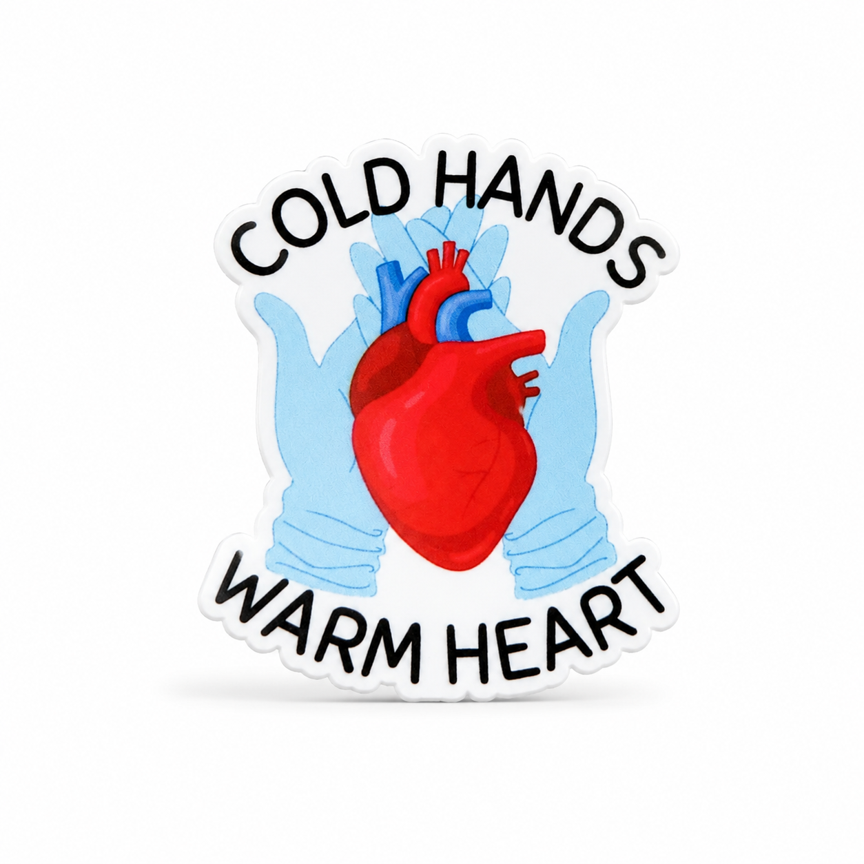 COLD HANDS WARM HEART cardiology plastic add-on with blue medical gloves holding a red anatomical heart, compatible with interchangeable badge reel bases.