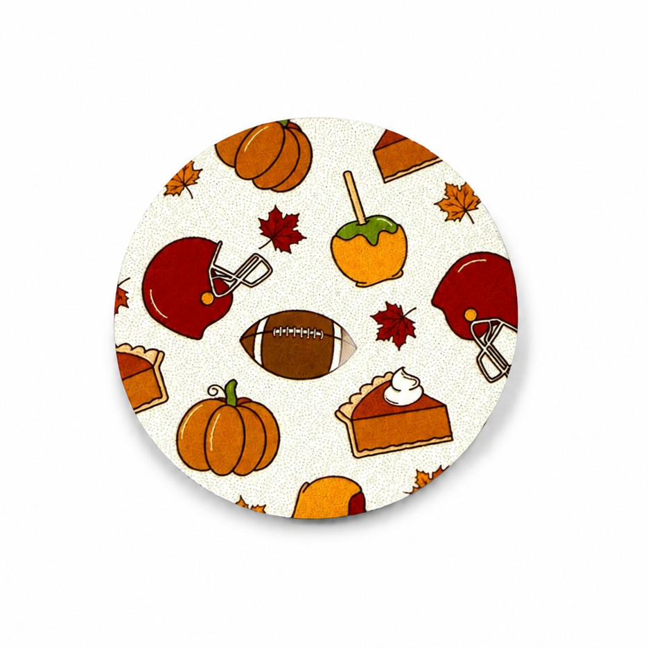 Fall Football Fun hard board add-on featuring football helmets, football, pumpkins, caramel apple, pumpkin pie, and autumn leaves, compatible with interchangeable badge reel bases.