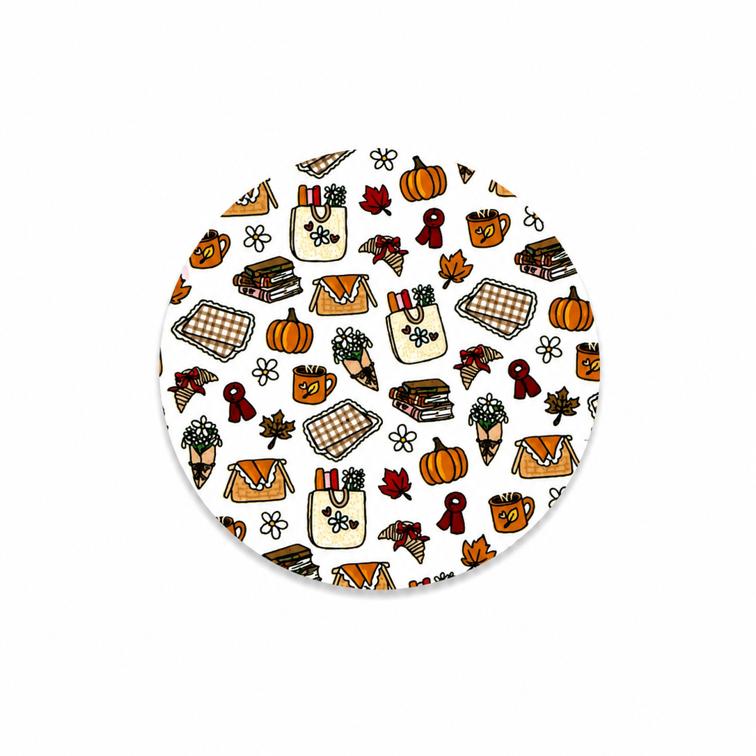 Hard board add-on featuring pumpkins, coffee mugs, books, sweaters, tote bags, cinnamon rolls, bouquets, pie, plaid blankets, and autumn leaves, compatible with interchangeable badge reel bases.