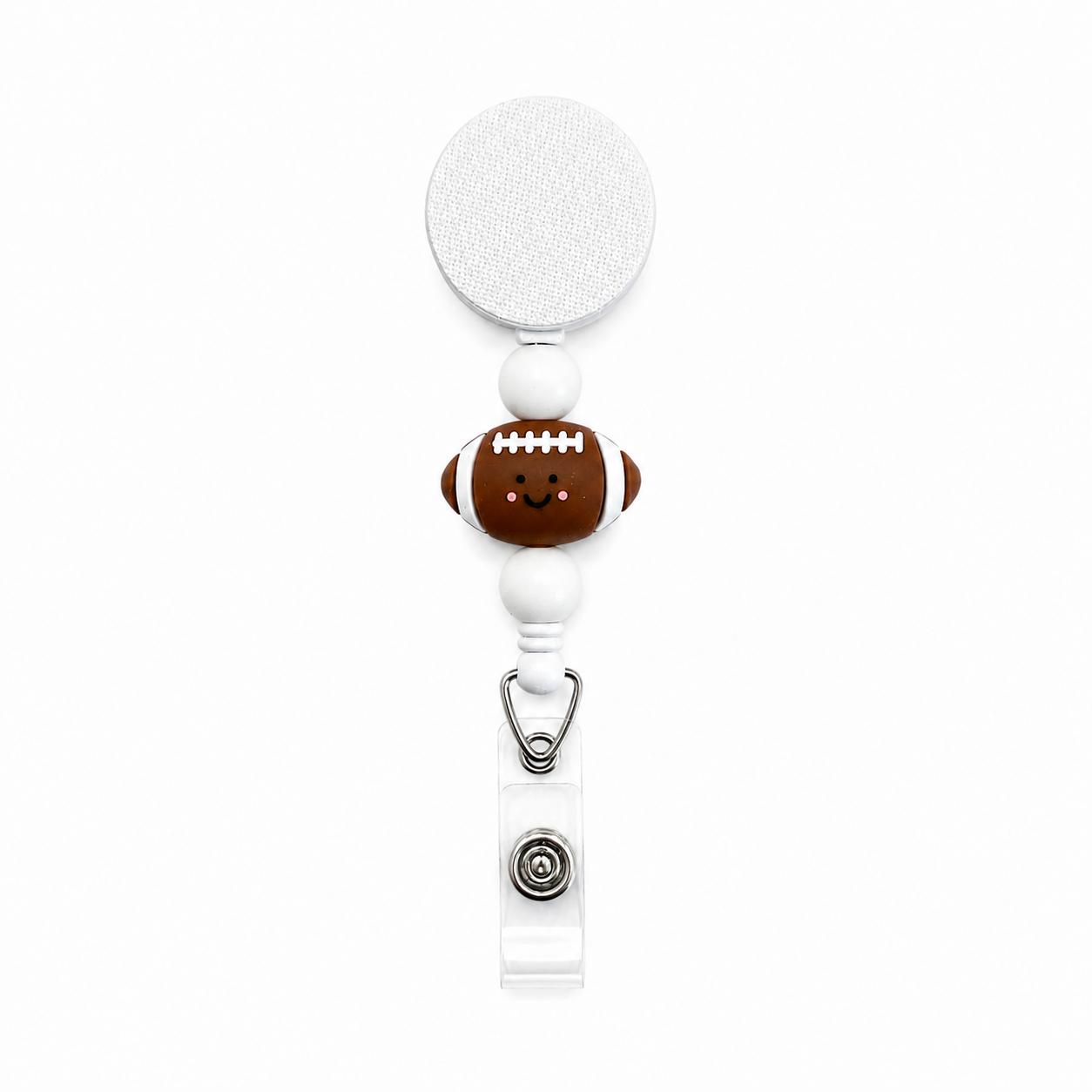 Cute football interchangeable badge reel featuring a smiling football topper with white silicone beads and a retractable badge holder for sports fans.