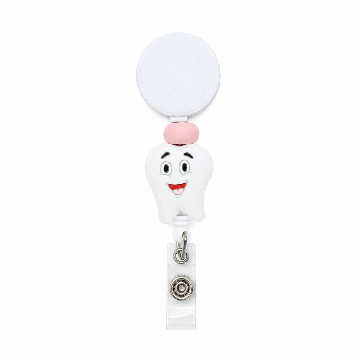 Smiling tooth badge reel with a white retractable reel, blush pink accent bead, and cute dental focal for dentists, hygienists, and dental office staff.