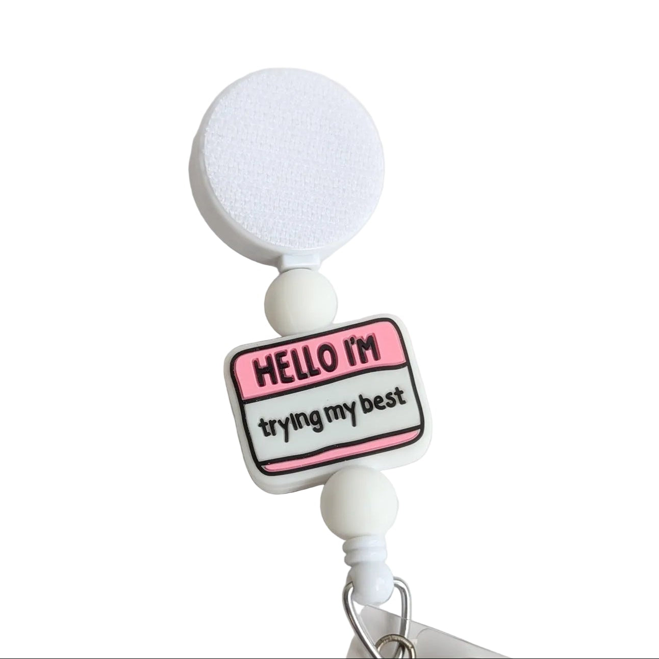 Hello I'm trying my best badge reel with white retractable reel, white silicone beads, and a pink motivational name tag topper for work.