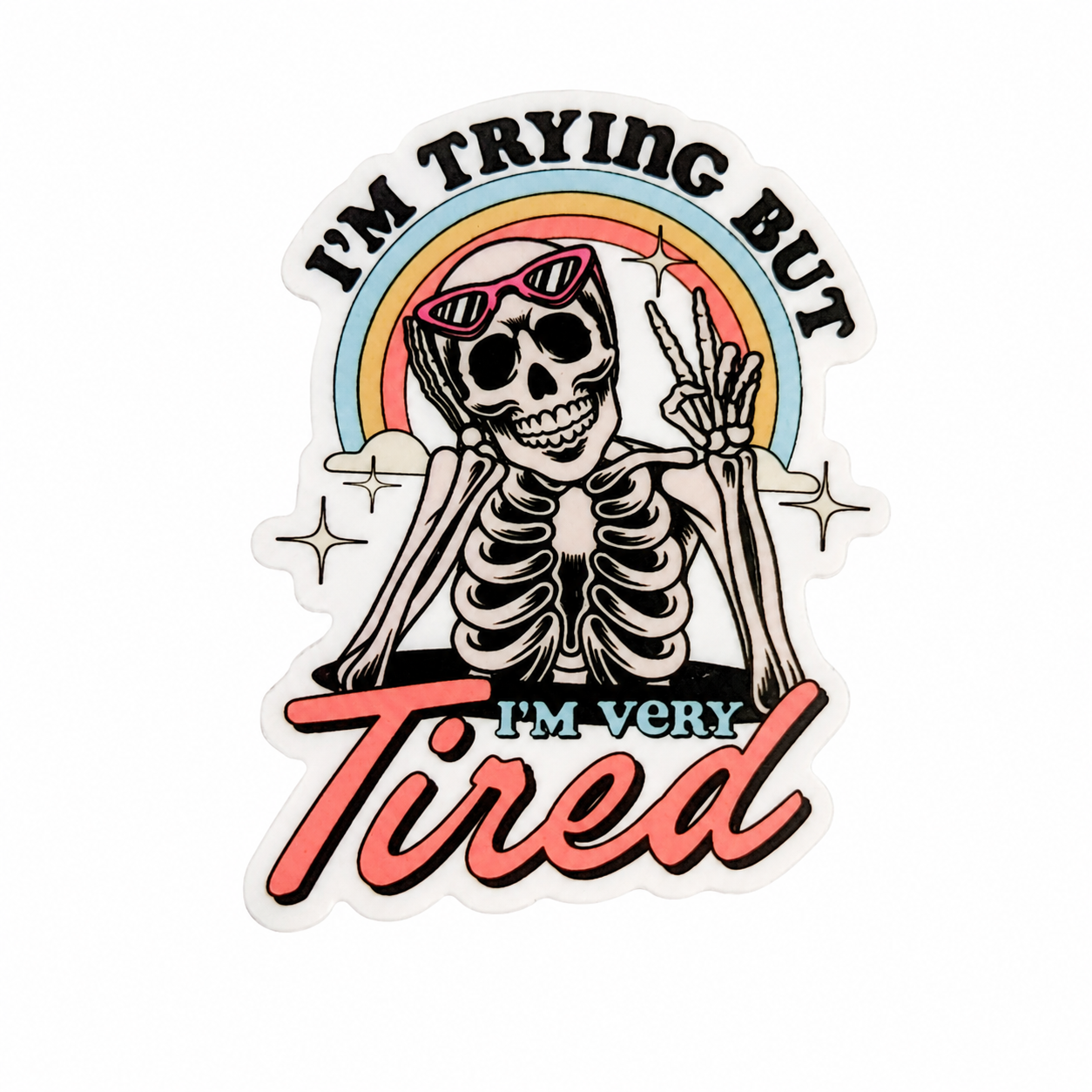 I'M TRYING BUT I'M VERY Tired plastic add-on with skeleton, sunglasses, rainbow, and peace sign, compatible with interchangeable badge reel bases.