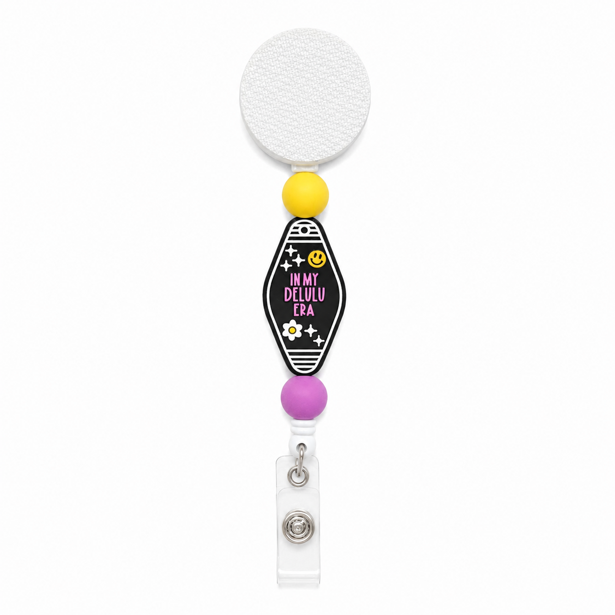 In My Delulu Era beaded badge reel featuring a retro motel key design with yellow and lavender beads, retractable badge reel, interchangeable badge reel, cute work badge accessory.