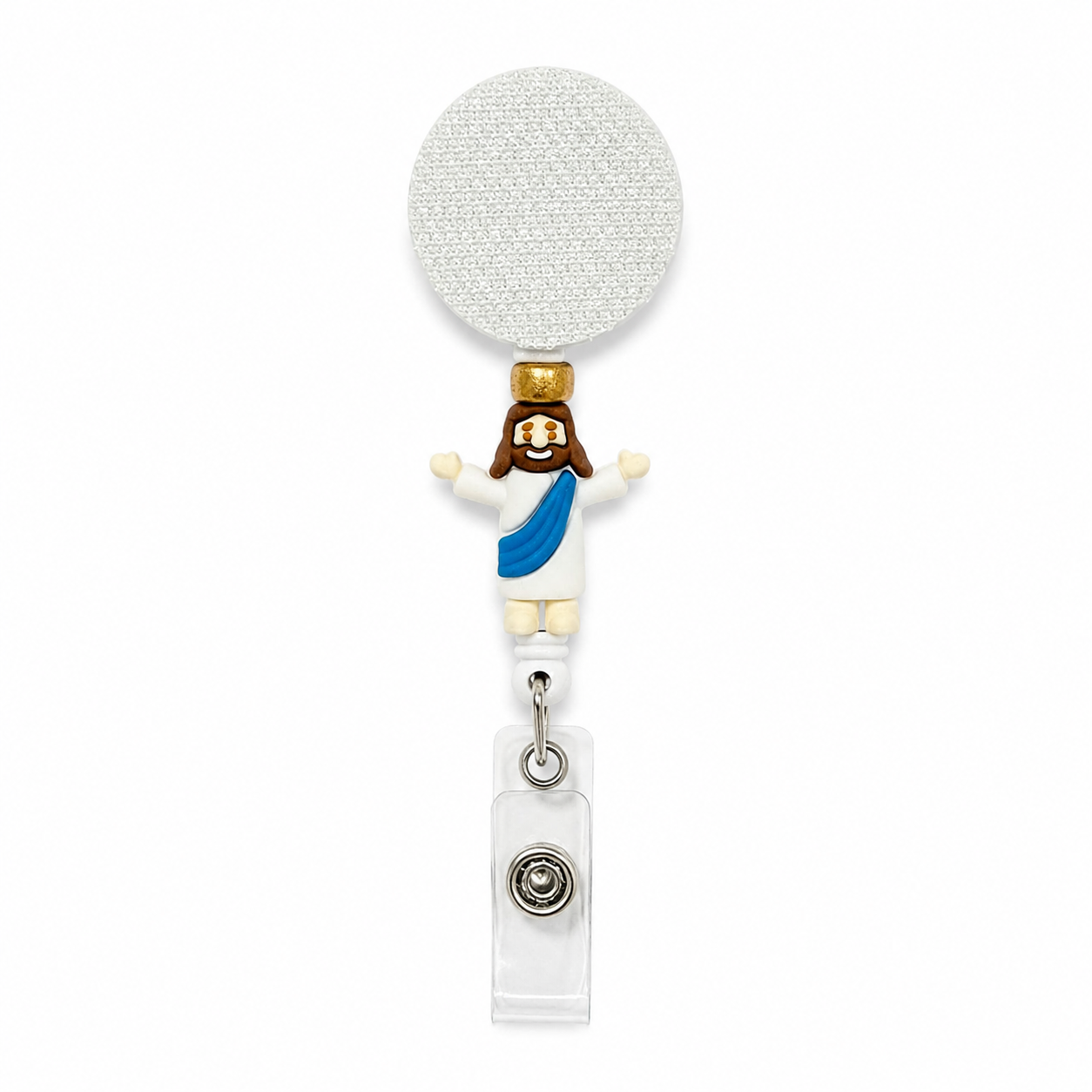 Jesus interchangeable badge reel with white retractable badge reel, gold accent bead, Jesus figure wearing a white robe and blue sash, Christian work badge accessory.
