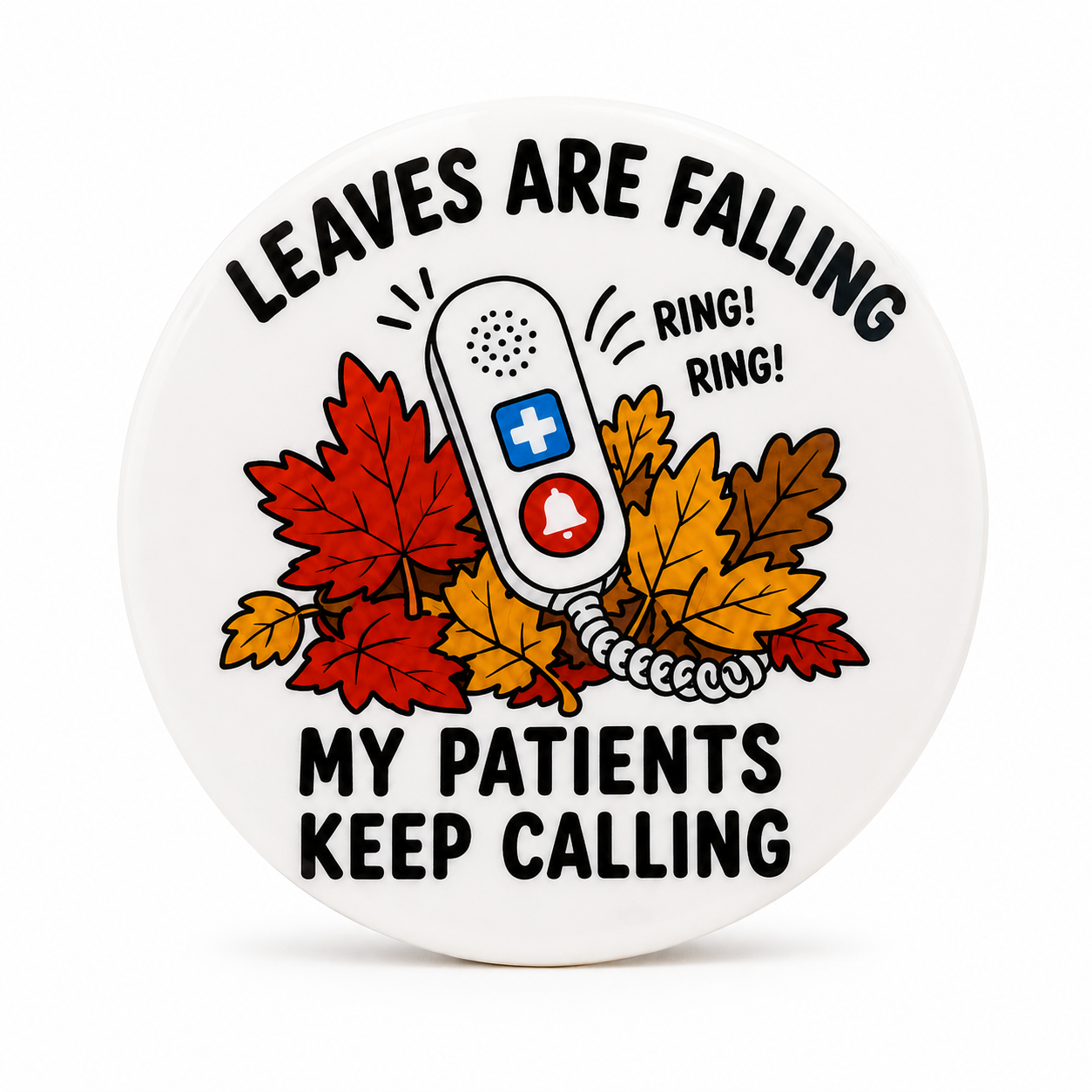 LEAVES ARE FALLING RING! RING! MY PATIENTS KEEP CALLING plastic add-on featuring colorful fall leaves and a nurse call button, compatible with interchangeable badge reel bases.