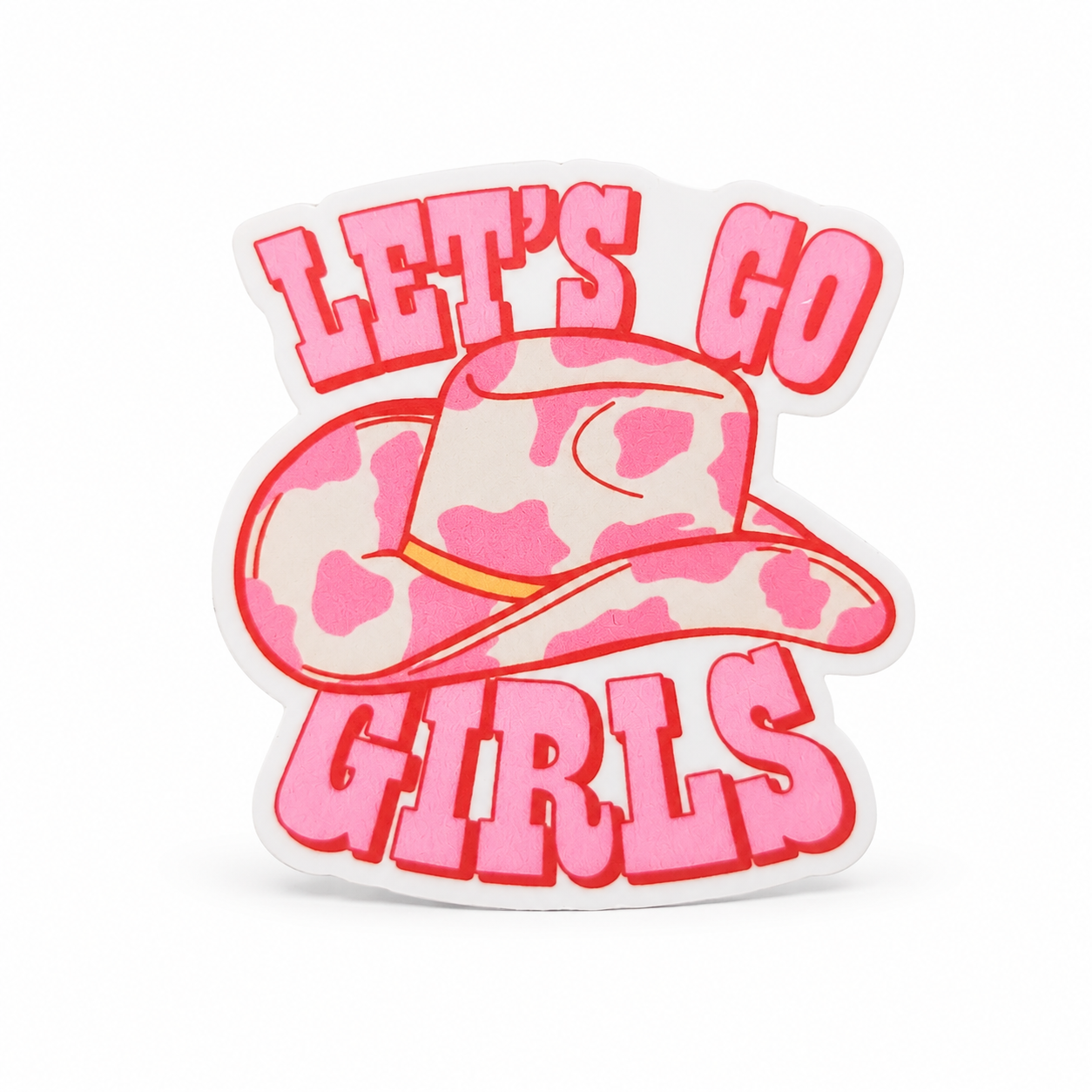 LET’S GO GIRLS plastic add-on with a pink cow-print cowboy hat design, compatible with interchangeable badge reel bases for cowgirls and western style fans.