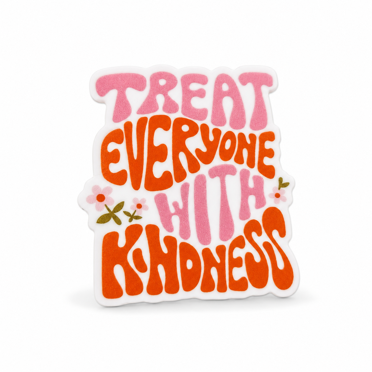TREAT EVERYONE WITH KINDNESS plastic add-on with pink and orange retro lettering and floral accents, compatible with interchangeable badge reel bases.
