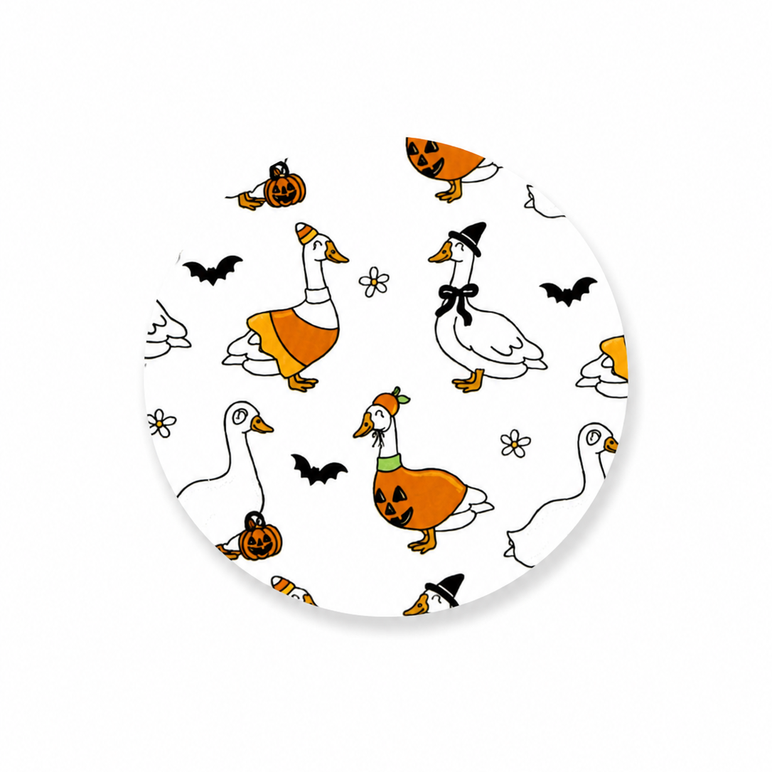 Trick or Treat Geese hard board add-on featuring geese in candy corn, pumpkin, and witch costumes with bats, pumpkins, candy corn, spider webs, and flowers. Compatible with interchangeable badge reel bases.