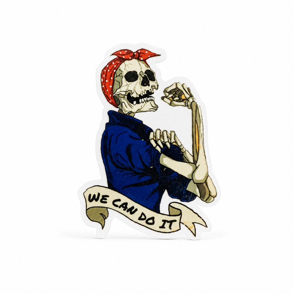 WE CAN DO IT plastic add-on with a skeleton wearing a red polka-dot headscarf and blue shirt, compatible with interchangeable badge reel bases