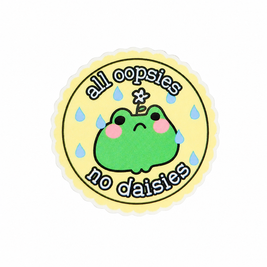 All Oopsies No Daisies plastic add-on featuring a cute green frog with raindrops and flower accent, compatible with interchangeable badge reel bases, funny animal badge topper and frog lover accessory