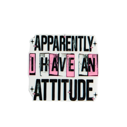 APPARENTLY I HAVE AN ATTITUDE plastic add-on featuring bold black and pink typography with sparkles, compatible with interchangeable badge reel bases, funny sarcastic work accessory