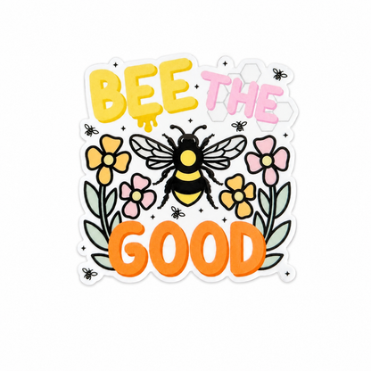 Plastic add-on featuring a bee surrounded by flowers with the phrase "BEE THE GOOD," compatible with interchangeable badge reel bases and perfect for bee lovers and positive nature-inspired accessories.
