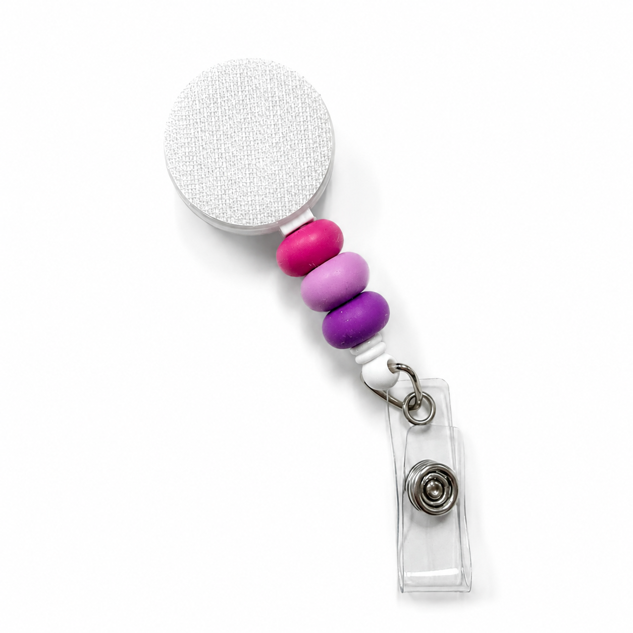 Berry Sorbet badge reel featuring bright pink, lavender, and berry purple decorative beads with a retractable badge reel design and secure badge holder attachment.
