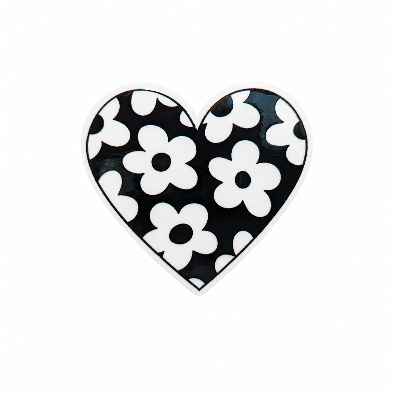 Black and white floral heart plastic add-on featuring retro daisy flowers in a heart shape, compatible with interchangeable badge reel bases and perfect for flower lovers