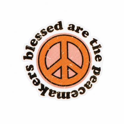 blessed are the peacemakers plastic add-on with orange peace sign and glitter-style lettering, compatible with interchangeable badge reel bases.