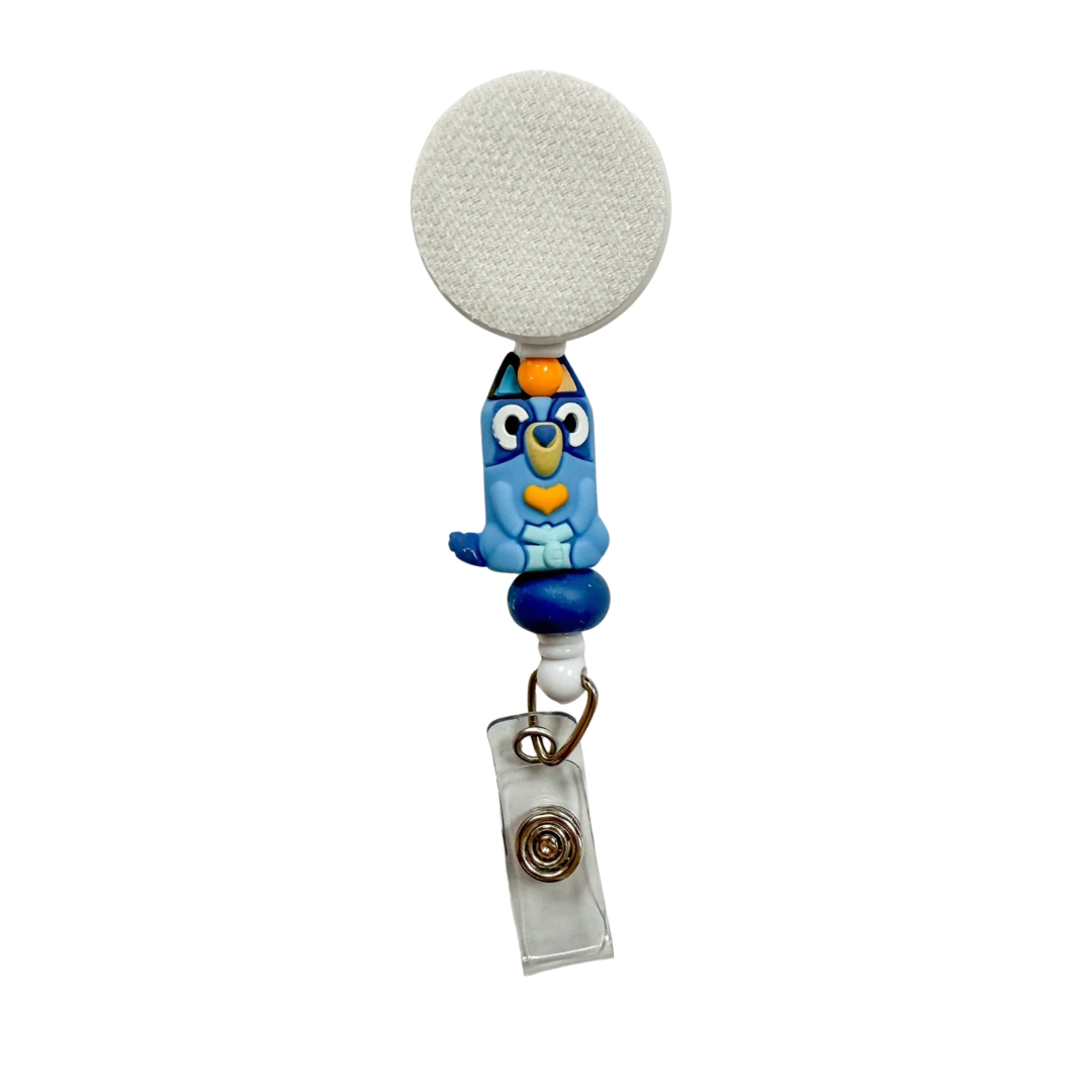 Badge reel with coordinating blue beads and a retractable holder. A fun work accessory for dog lovers, teachers and care teams.