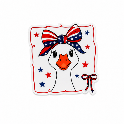 Patriotic goose plastic add-on with red white and blue bow and stars for compatible interchangeable badge reel bases