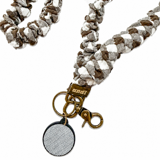 Brown Checkered Interchangeable Andi Lanyard featuring a brown and cream checkered fabric pattern, interchangeable badge lanyard compatible with interchangeable hardboards and plastic add-ons.