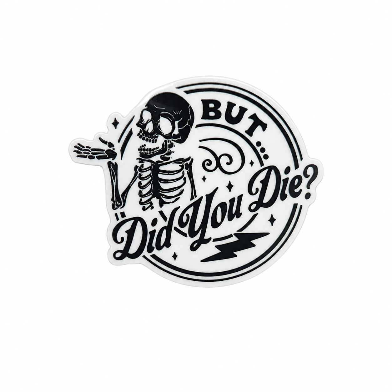 Plastic add-on featuring a skeleton and the phrase "BUT... Did You Die?" compatible with interchangeable badge reel bases and designed as a funny sarcastic skeleton accessory.