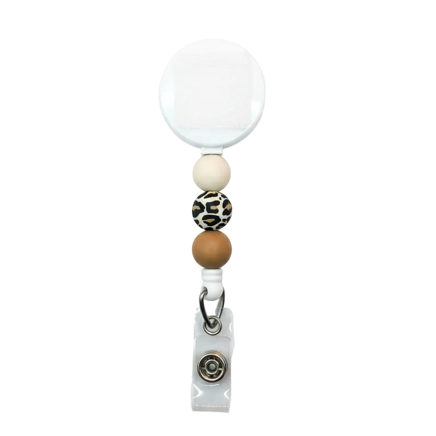 Cheetah print interchangeable badge reel featuring neutral cream, leopard print, and tan silicone beads with a retractable badge holder for nurses, teachers, office staff, and healthcare professionals.