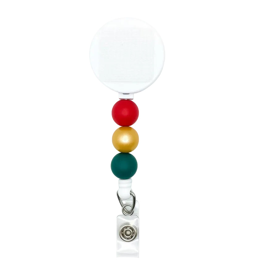 Christmas beaded badge reel with white retractable reel, red, metallic gold, and green silicone beads, festive interchangeable work badge accessory.