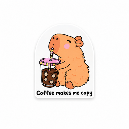 Coffee Makes Me Capy plastic add-on featuring a cute capybara drinking iced coffee compatible with interchangeable badge reel bases