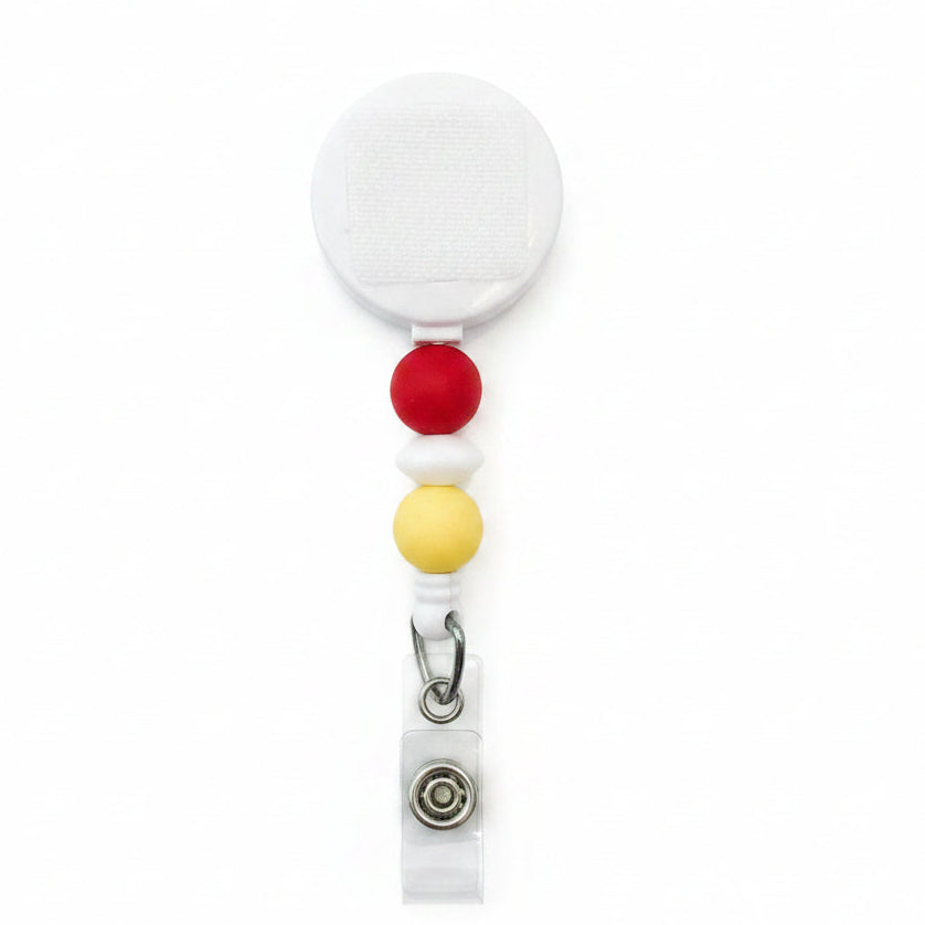 Beaded badge reel with white retractable reel and red, white, and yellow silicone beads, interchangeable badge reel for everyday work.