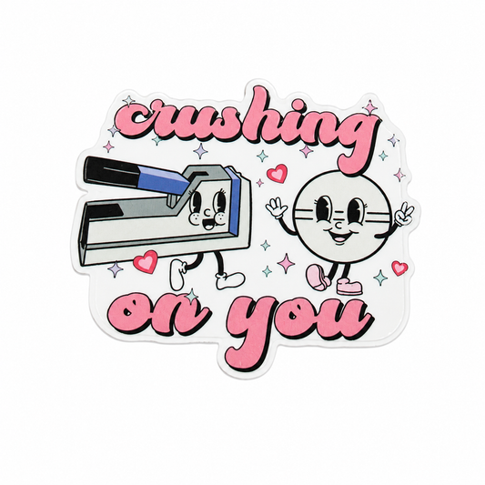 Crushing On You plastic add-on featuring a cute pill crusher and tablet character with hearts, compatible with interchangeable badge reel bases and ideal for pharmacy workers.