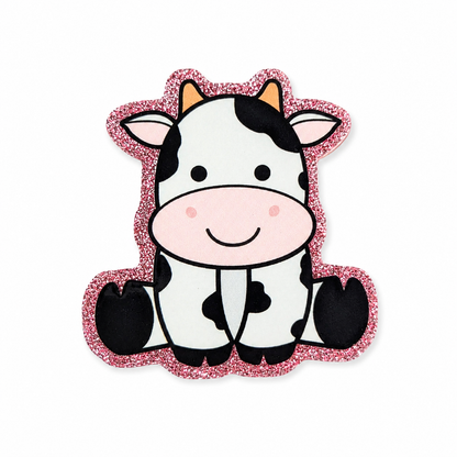 Cute cow plastic add-on featuring a black and white cow on a pink glitter-inspired background, compatible with interchangeable badge reel bases and perfect for cow lovers.