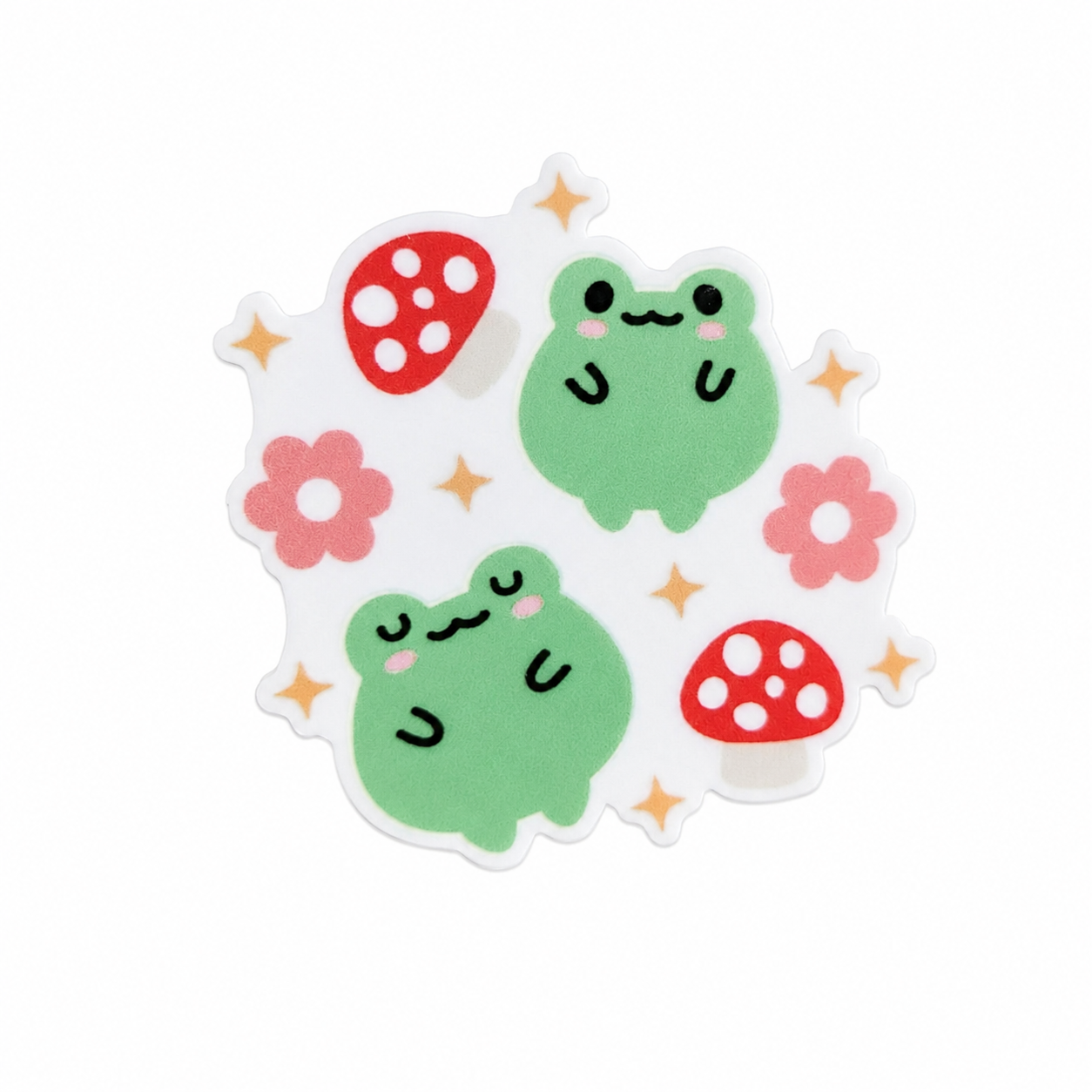 Cute Frog Mushroom plastic add-on with two green frogs, red mushrooms, pink flowers, and sparkle accents, compatible with interchangeable badge reel bases
