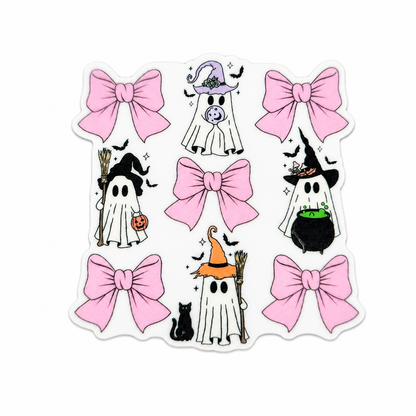 Plastic add-on featuring cute Halloween ghosts with witch hats, pink bows, a cauldron, broomsticks, and a black cat, compatible with interchangeable badge reel bases.