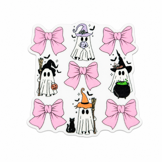 Plastic add-on featuring cute Halloween ghosts with witch hats, pink bows, a cauldron, broomsticks, and a black cat, compatible with interchangeable badge reel bases.