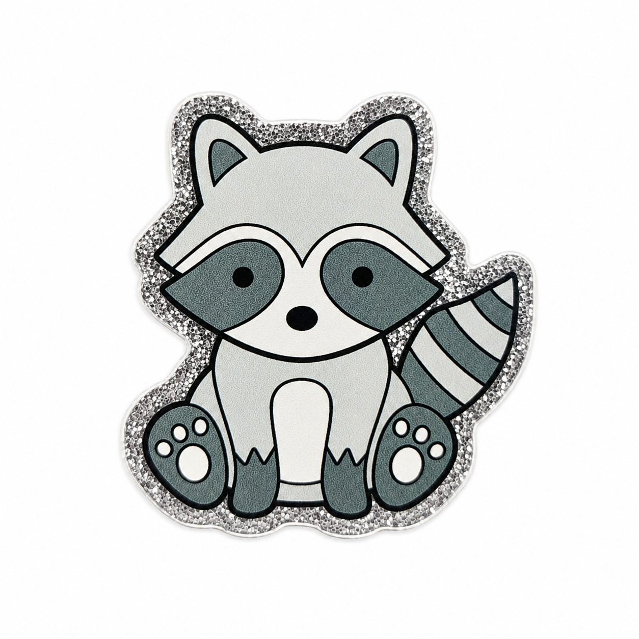 Cute raccoon plastic add-on with a glitter-style border, designed for compatible interchangeable badge reel bases and perfect for animal lovers and woodland-themed accessories.