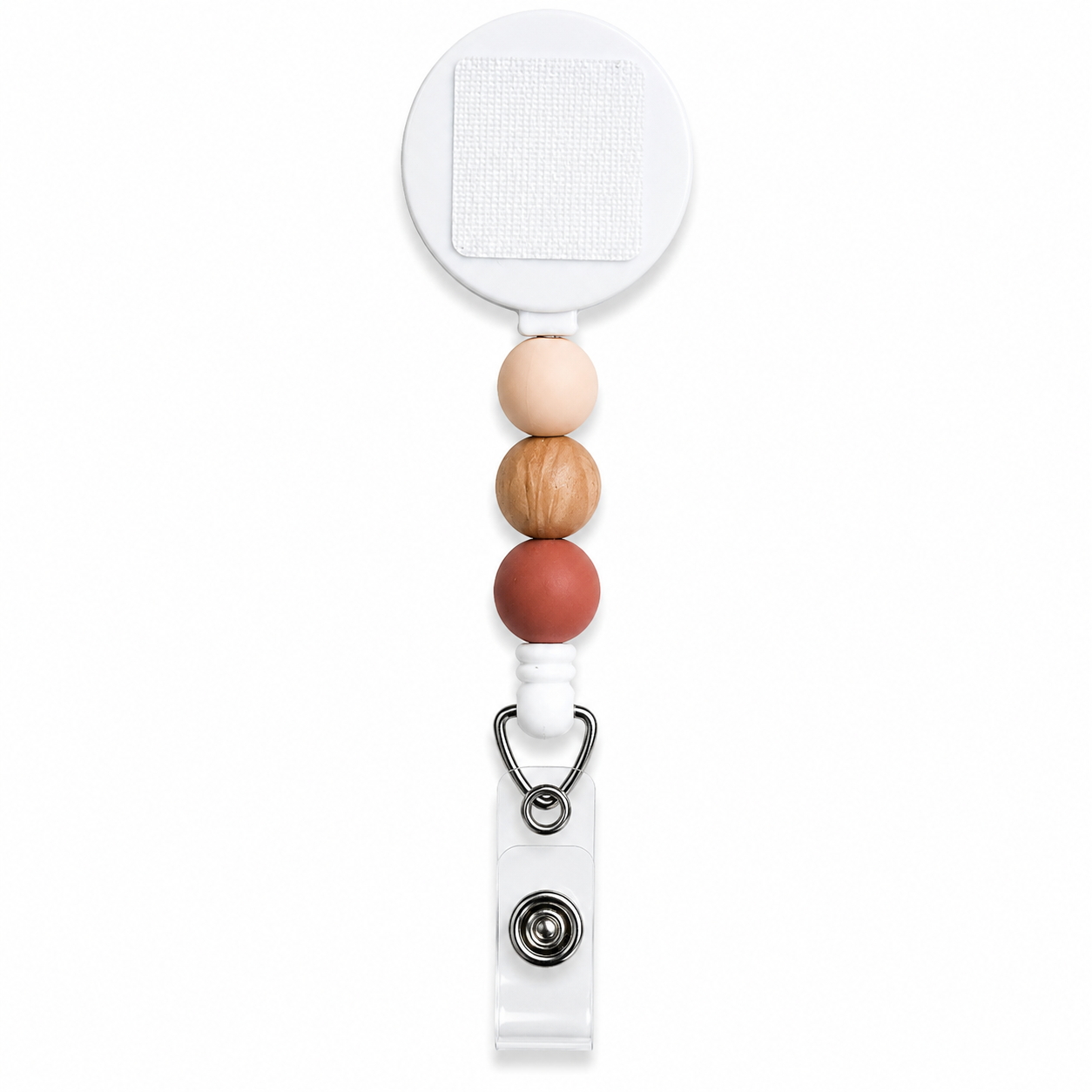 Desert Clay interchangeable beaded badge reel featuring blush, natural wood, and terracotta silicone beads with a retractable badge holder.