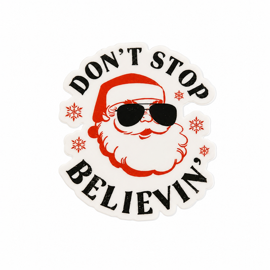 DON'T STOP BELIEVIN' plastic add-on featuring Santa with sunglasses and snowflake accents, compatible with interchangeable badge reel bases.