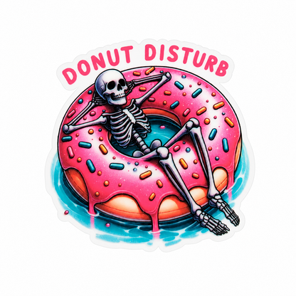 DONUT DISTURB plastic add-on featuring a skeleton relaxing in a pink frosted donut float, compatible with interchangeable badge reel bases, funny spooky accessory