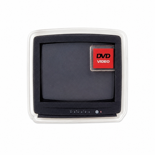 DVD VIDEO plastic shaker add-on featuring a retro television screen design, compatible with interchangeable badge reel bases and perfect for nostalgia lovers and retro tech fans.