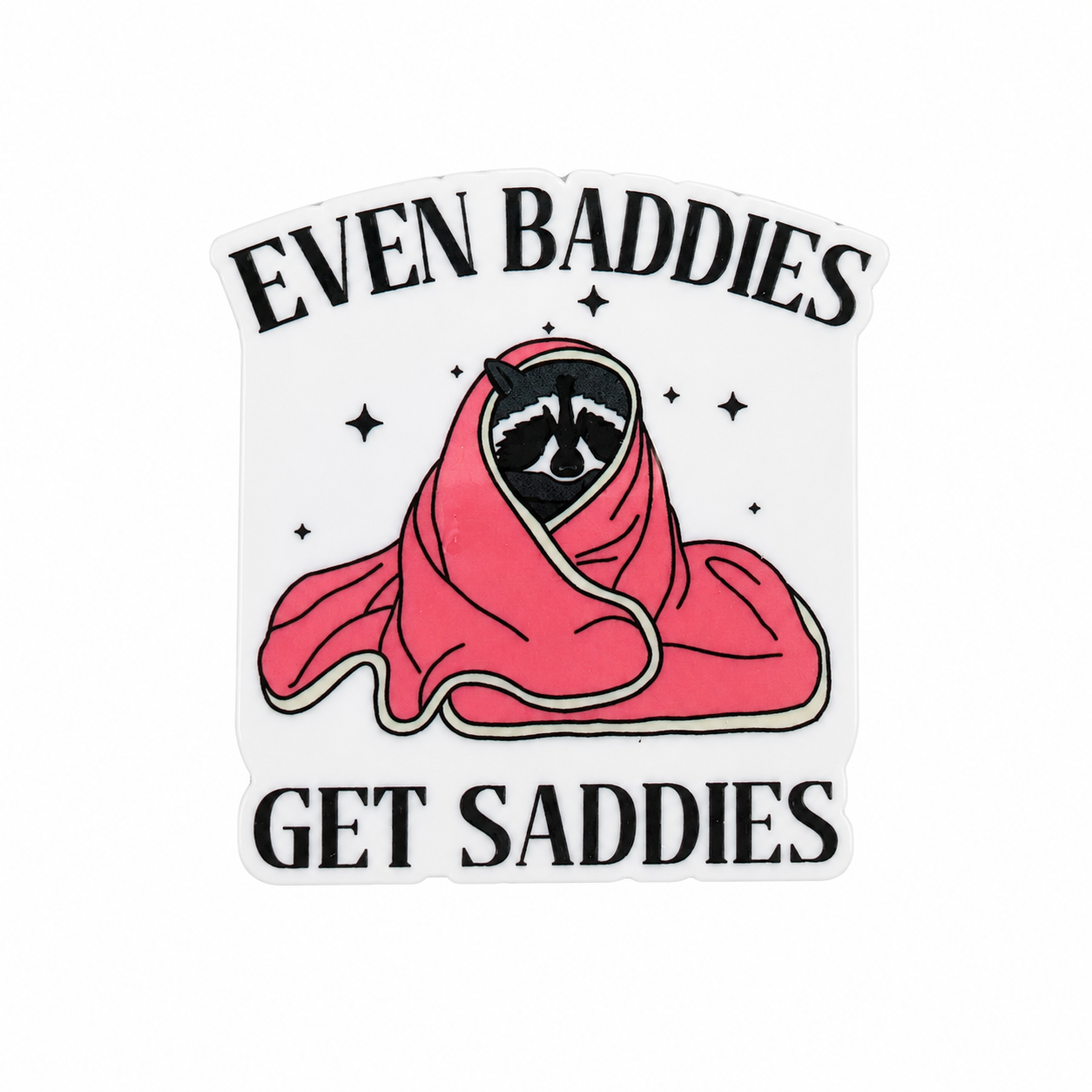 EVEN BADDIES GET SADDIES plastic add-on featuring a raccoon wrapped in a pink blanket, compatible with interchangeable badge reel bases and mental health themed accessories