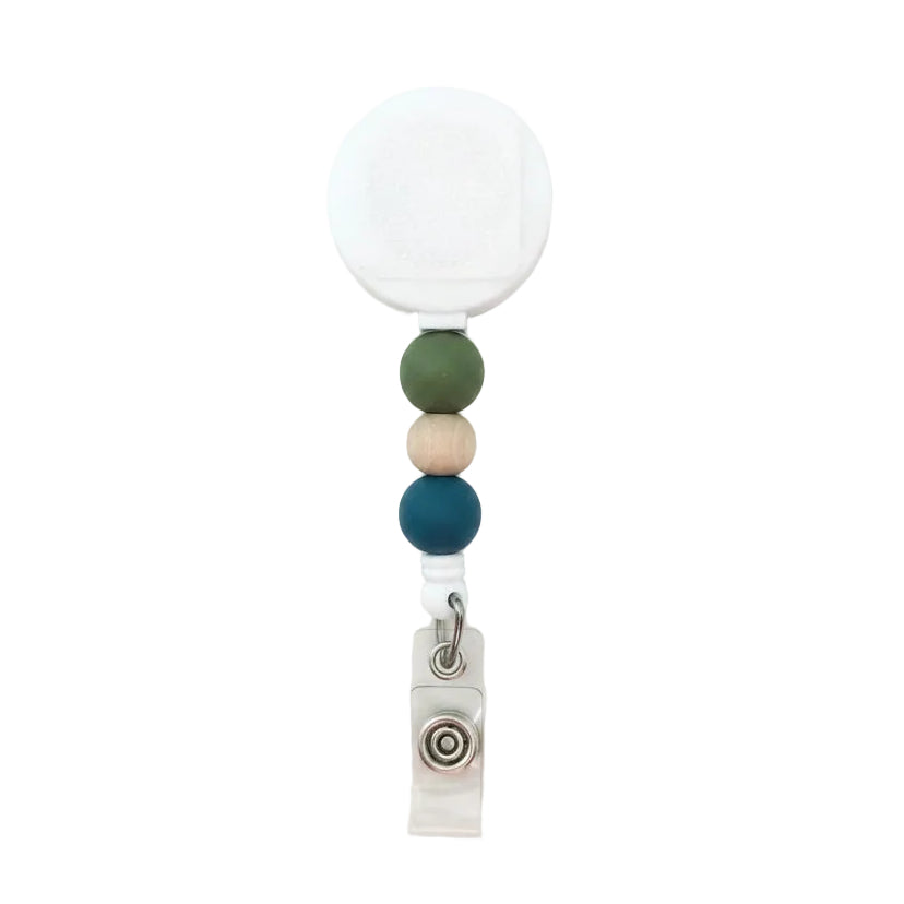 Beaded badge reel with white retractable reel, sage green, natural wood, and deep blue silicone beads, interchangeable badge reel for work.