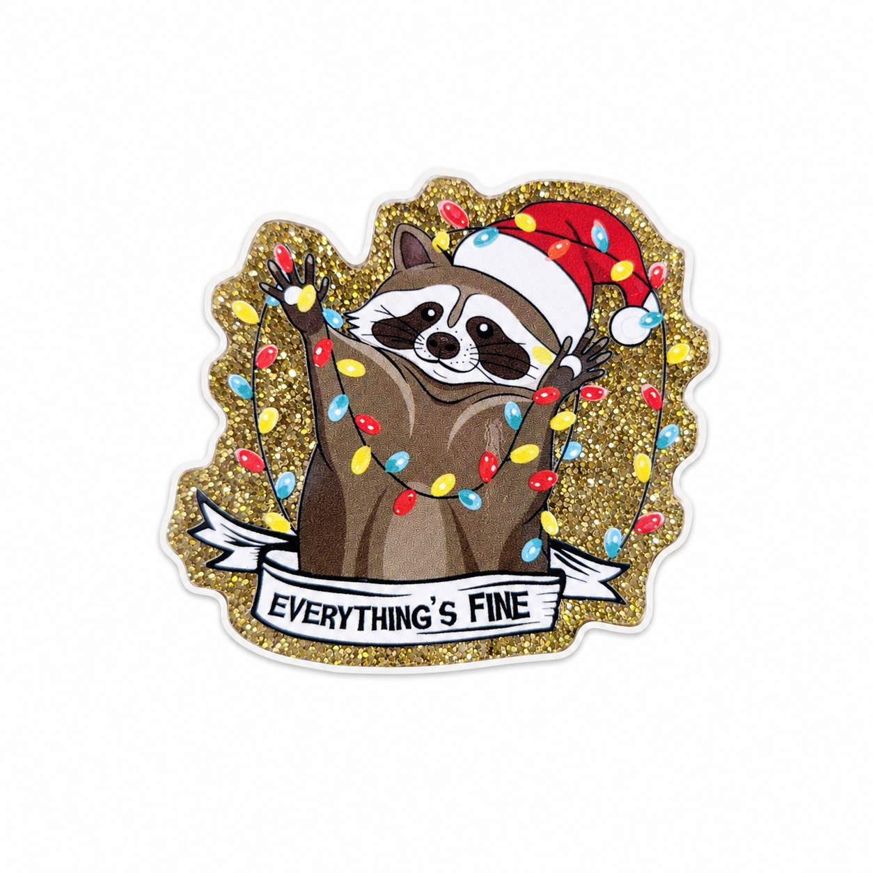 EVERYTHING'S FINE plastic add-on featuring a raccoon wearing a Santa hat tangled in colorful Christmas lights on a glitter-style background, compatible with interchangeable badge reel bases.