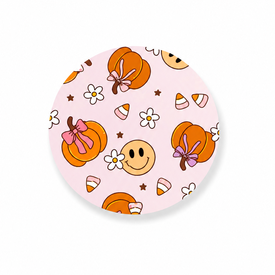Fall Makes Me Smile hard board add-on featuring pumpkins with bows, smiley face, candy corn, flowers, and stars on a pink background. Compatible with interchangeable badge reel bases and perfect as a seasonal work badge accessory.