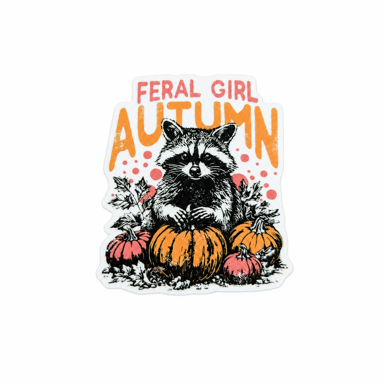 FERAL GIRL AUTUMN plastic add-on featuring a cute raccoon sitting among pumpkins in a fall-themed design, compatible with interchangeable badge reel bases, perfect for autumn lovers and animal enthusiasts