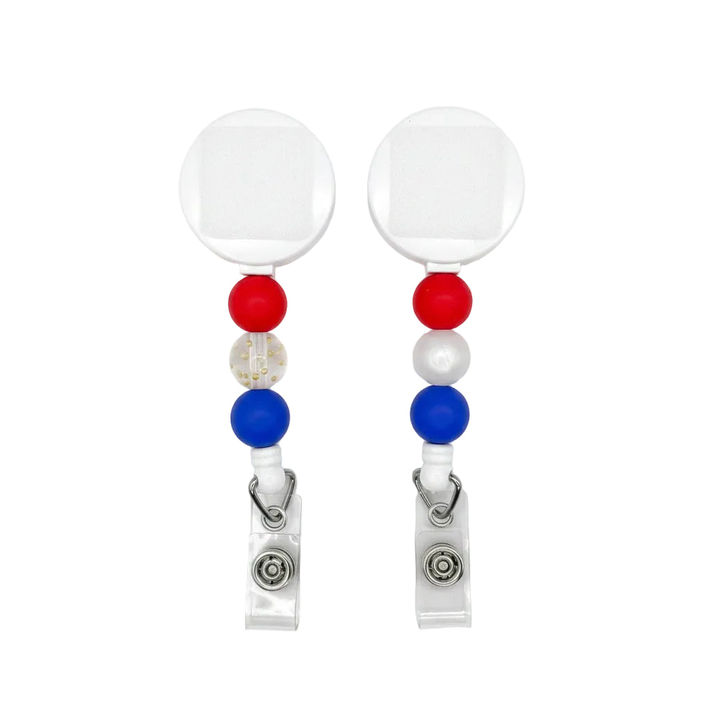 Interchangeable patriotic badge reel featuring red, white, and blue silicone beads with retractable badge holder. Perfect for Fourth of July, Memorial Day, Veterans Day, nurses, teachers, healthcare workers, and office staff.