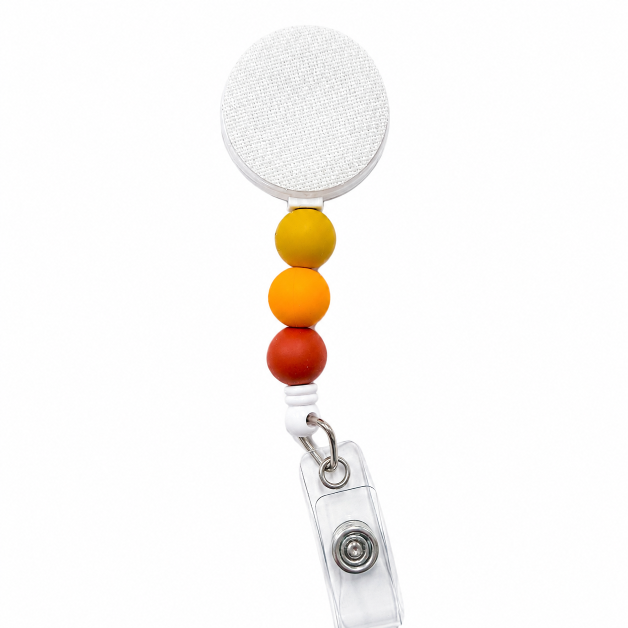 Golden Hour badge reel featuring mustard yellow, orange, and amber decorative beads, retractable badge reel design, and secure badge holder attachment for everyday work use.