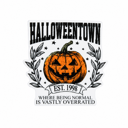 HALLOWEENTOWN EST. 1998 WHERE BEING NORMAL IS VASTLY OVERRATED plastic add-on featuring a vintage jack o lantern pumpkin and leafy accents compatible with interchangeable badge reel bases